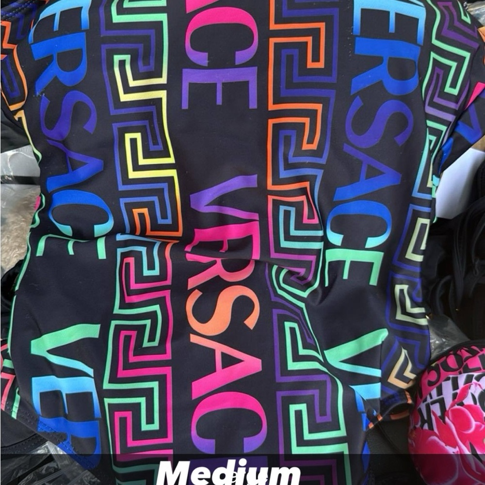 Black swimsuit with Vibrant Multicolor Print